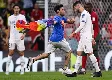 A man carrying a rainbow flag invades the field during a FIFA World Cup game - Sports