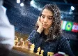 Thumbnail image of At an international chess match, Sara Khadem of Iran competes uncovered