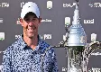 Thumbnail image of Rory McIlroy holds off rival Patrick Reed with birdie on 18 to seal Dubai win