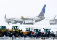 Heavy snowfall in the Midwest has caused the cancellation of more than 1,600 flights
